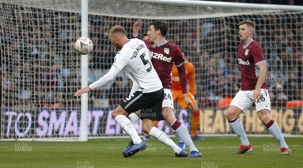 050119 - Aston Villa v Swansea City - FA Cup Third Round - Mike Van der Hoorn  of Swansea defends the Swansea goal against Tommy Elphick of Aston Villa  