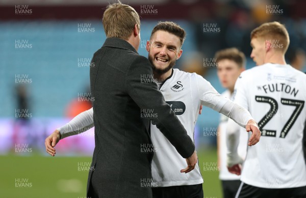 050119 - Aston Villa v Swansea City - FA Cup Third Round - Matt Grimes of Swansea hugs Manager Graham Potter at the end of the match  