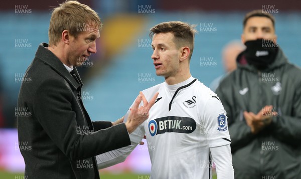 050119 - Aston Villa v Swansea City - FA Cup Third Round - Manager Graham Potter of Swansea greets Besant Celina at the end of the match  