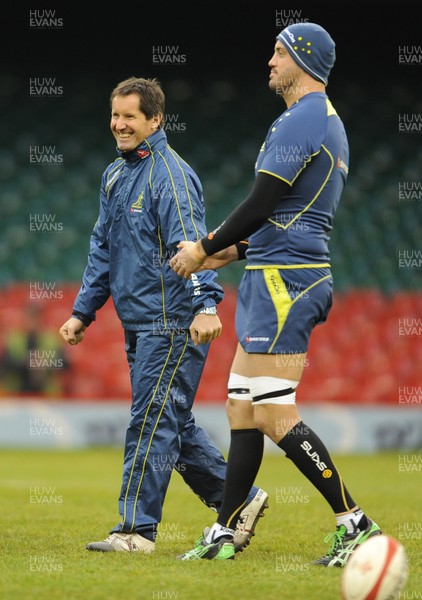 301112 - Australia Rugby Captains Run -Head coach Robbie Deans and Nathan Sharpe during training