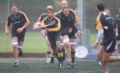 04.11.10..Australia Rugby Training session, University Playing Field, Treforest-  Australia's Will Genia during a wet training session at Treforest near Cardiff 