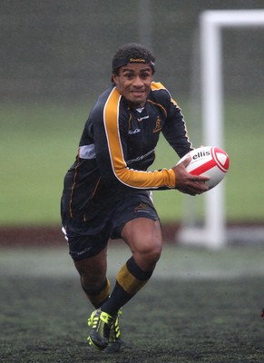 04.11.10..Australia Rugby Training session, University Playing Field, Treforest-  Australia's Will Genia during a wet training session at Treforest near Cardiff 