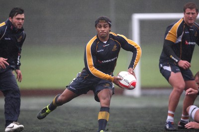 04.11.10..Australia Rugby Training session, University Playing Field, Treforest-  Australia's Will Genia during a wet training session at Treforest near Cardiff 