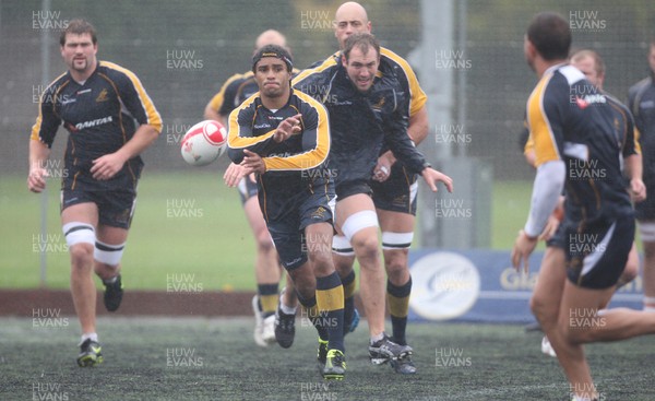 04.11.10..Australia Rugby Training session, University Playing Field, Treforest-  Australia's Will Genia during a wet training session at Treforest near Cardiff 