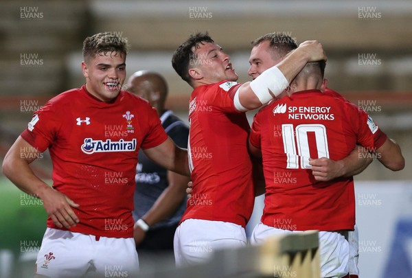 300518 - Australia U20 v Wales U20, World Rugby U20 Championship 2018 Pool A, France - Players celebrate with Ioan Nicolas of Wales after he scores try