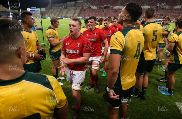 300518 - Australia U20 v Wales U20, World Rugby U20 Championship 2018 Pool A, France - Tommy Reffell of Wales leads the team through the Australia lineup at the end of the match