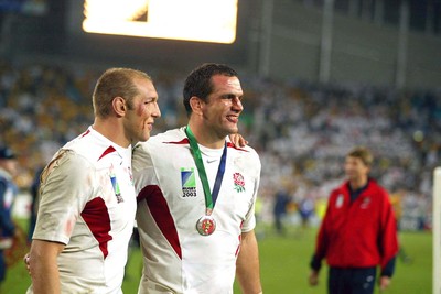 221103 - Australia v England - Rugby World Cup Final - England's Ben Kay and Martin Johnson celebrate