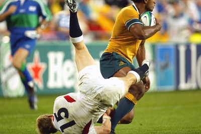 221103 - Australia v England - Rugby World Cup Final - Australia's Lote Tuqiri gets out of tackle by Josh Lewsey