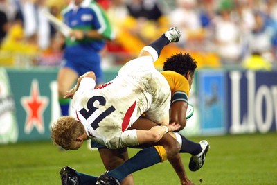 221103 - Australia v England - Rugby World Cup Final - Australias Lote Tuqiri gets out of tackle by Josh Lewsey