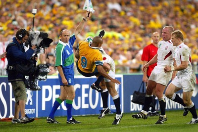 221103 - Australia v England - Rugby World Cup Final - England's Mike Tindall tackles George Gregan