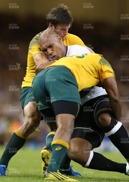 230915 - Australia v Fiji, Rugby World Cup 2015 - Nemani Nadolo of Fiji is wrapped up by the Australian defence