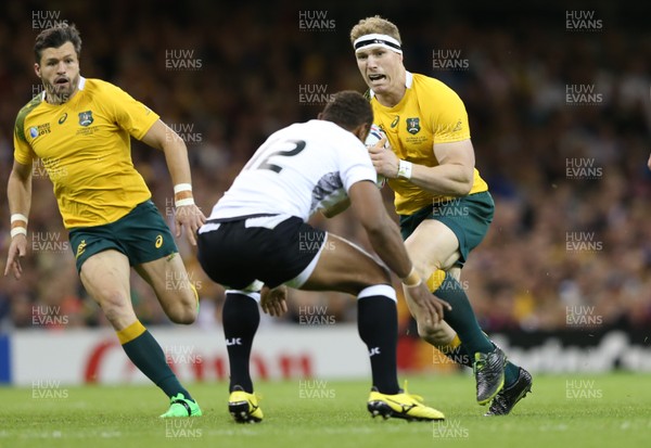 230915 - Australia v Fiji, Rugby World Cup 2015 - David Pocock of Australia is tackled by Gabiriele Lovobalavu of Fiji