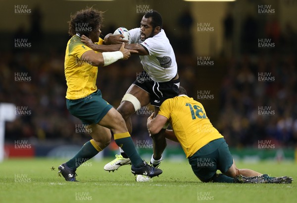 230915 - Australia v Fiji, Rugby World Cup 2015 - Peceli Yato of Fiji is tackled by Greg Holmes of Australia and Scott Fardy of Australia