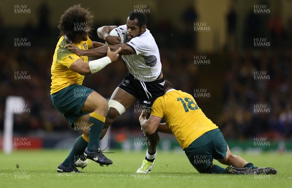 230915 - Australia v Fiji, Rugby World Cup 2015 - Peceli Yato of Fiji is tackled by Greg Holmes of Australia and Scott Fardy of Australia