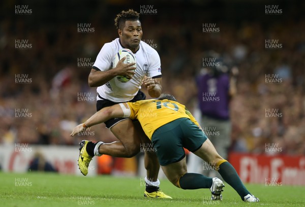 230915 - Australia v Fiji, Rugby World Cup 2015 - Metuisela Talebula of Fiji is tackled by Bernard Foley of Australia