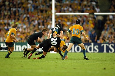 151103 - Australia v New Zealand - Rugby World Cup Semi Final - Mat Rogers is tackled by Byron Kelleher