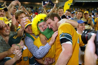 151103 - Australia v New Zealand - Rugby World Cup Semi Final - Australia's fans celebrate with Justin Harrison