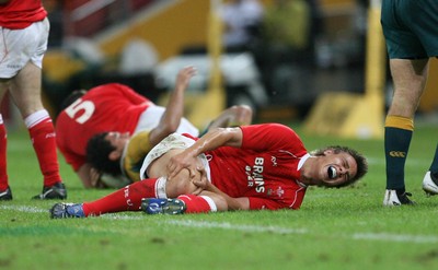 02.06.07 AUSTRALIA v WALES, 2nd Test ,Brisbane. Wales Chris Czekaj writhes in agony after injury to knee 