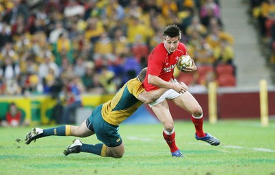 02.06.07 AUSTRALIA v WALES, 2nd Test ,Brisbane. Wales Chris Czekaj is tackled by Stephen Moore 