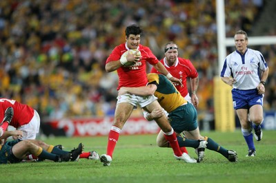 02.06.07 AUSTRALIA v WALES, 2nd Test ,Brisbane. Wales Mike Phillips is tackled by Stirling Mortlock 
