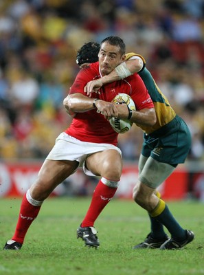 02.06.07 AUSTRALIA v WALES, 2nd Test ,Brisbane. Wales Sonny Parker is tackled by Stephen Larkham  