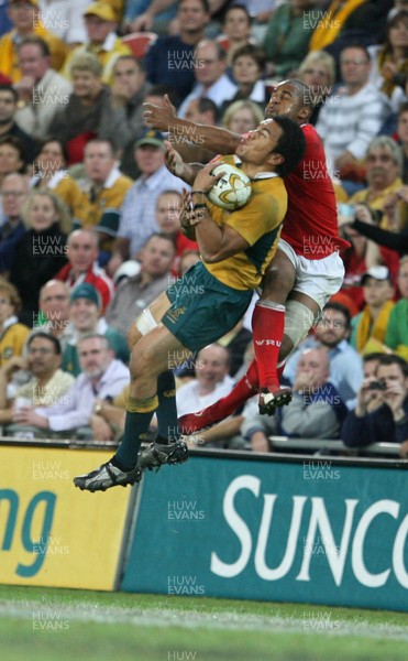 02.06.07 AUSTRALIA v WALES, 2nd Test ,Brisbane. Wales Aled Brew tackles Digby Loane  