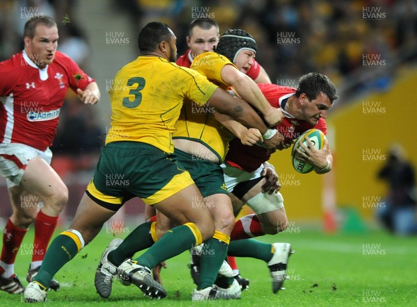 090612 - Australia v Wales - Castrol EDGE Series -Sam Warburton of Wales is tackled by Benn Robinson of Australia