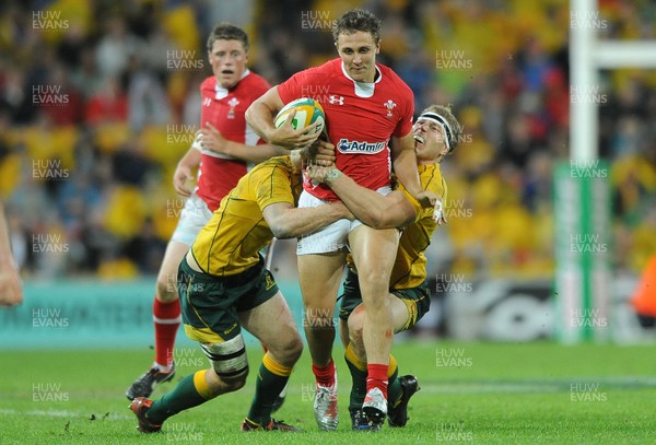 090612 - Australia v Wales - Castrol EDGE Series -Ashley Beck of Wales is tackled by Pat McCabe and David Pocock of Australia