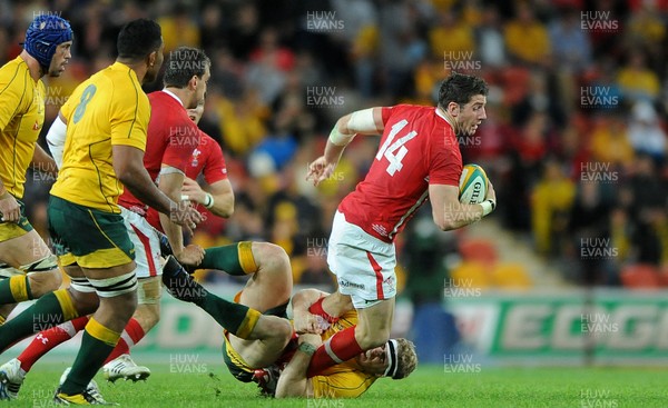 090612 - Australia v Wales - Castrol EDGE Series -Alex Cuthbert of Wales is tackled by David Pocock of Australia