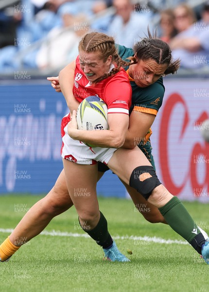 221022 - Australia v Wales, Women’s Rugby World Cup, Pool A - Lisa Neumann of Wales is tackled by Bienne Terita of Australia