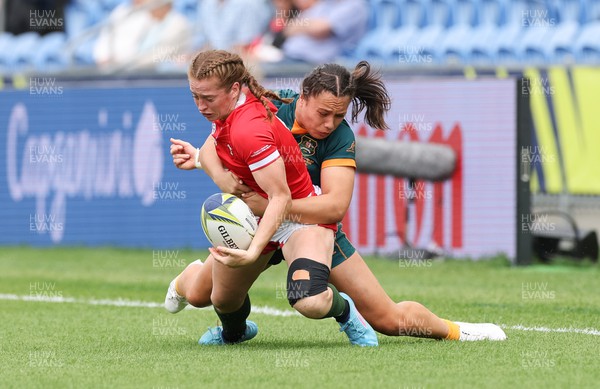 221022 - Australia v Wales, Women’s Rugby World Cup, Pool A - Lisa Neumann of Wales is tackled by Bienne Terita of Australia