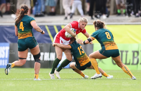 221022 - Australia v Wales, Women’s Rugby World Cup, Pool A - Carys Williams-Morris of Wales is tackled by Georgina Friedrichs of Australia