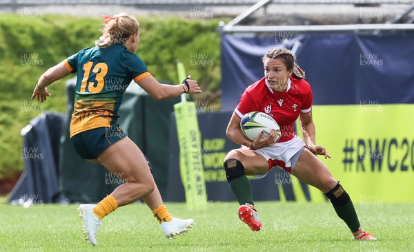 221022 - Australia v Wales, Women’s Rugby World Cup, Pool A - Jasmine Joyce of Wales gets away from Georgina Friedrichs of Australia