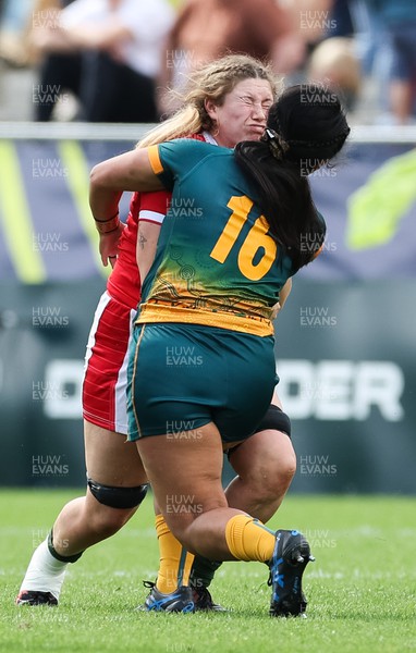 221022 - Australia v Wales, Women’s Rugby World Cup, Pool A - Gwen Crabb of Wales is stopped by Tania Naden of Australia