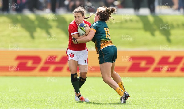 221022 - Australia v Wales, Women’s Rugby World Cup, Pool A - Jasmine Joyce of Wales sli[ps the tackle from Lori Cramer of Australia