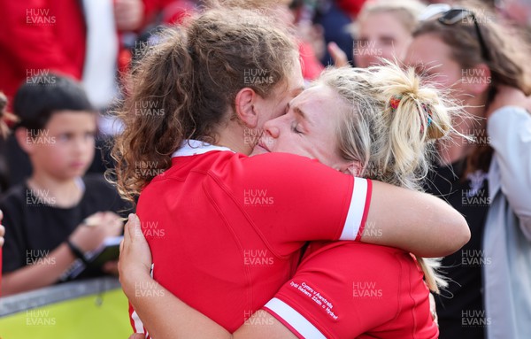 221022 - Australia v Wales, Women’s Rugby World Cup, Pool A - Natalia John of Wales and Alex Callender of Wales console each other at the end of the match