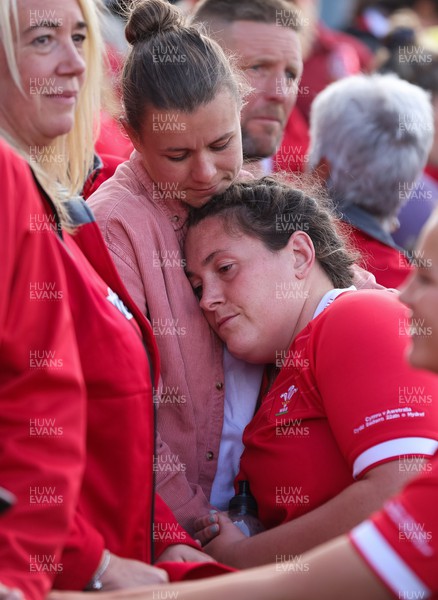 221022 - Australia v Wales, Women’s Rugby World Cup, Pool A - Cerys Hale of Wales is consoled by her fiancee at the end of the match