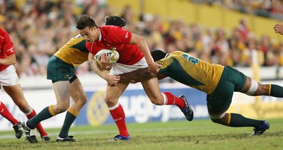 26.05.07  AUSTRALIA v WALES, Telstra Stadium,Sydney Wales Chris czekaj is tackled by Rocky Elsom and Sam Norton-Knight 