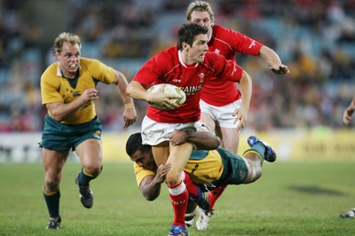 26.05.07  AUSTRALIA v WALES, Telstra Stadium,Sydney Wales James Hook is tackled Wycliff Palu 
