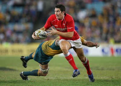26.05.07  AUSTRALIA v WALES, Telstra Stadium,Sydney Wales James Hook beats tackle by Nathan Sharpe 