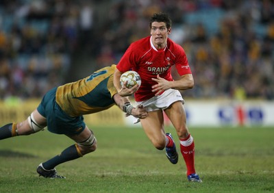 26.05.07  AUSTRALIA v WALES, Telstra Stadium,Sydney Wales James Hook beats tackle by Nathan Sharpe 