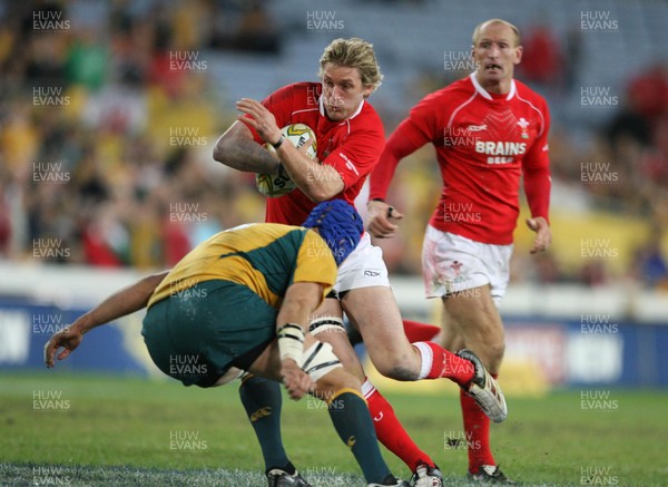 26.05.07  AUSTRALIA v WALES, Telstra Stadium,Sydney Wales Jamie Robinson is tackled by Nathan Sharpe 