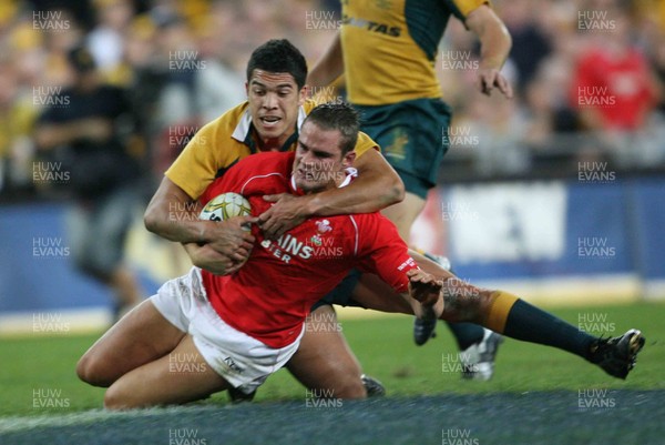 26.05.07  AUSTRALIA v WALES, Telstra Stadium,Sydney Wales Lee Byrne is tackled by Mark Gerrard 