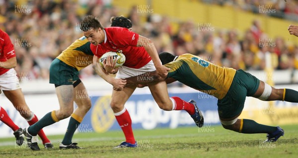 26.05.07  AUSTRALIA v WALES, Telstra Stadium,Sydney Wales Chris czekaj is tackled by Rocky Elsom and Sam Norton-Knight 