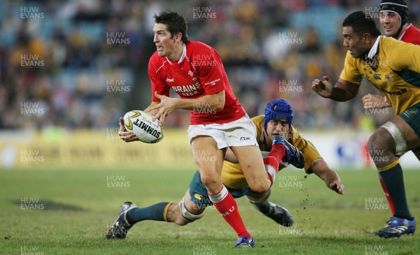 26.05.07  AUSTRALIA v WALES, Telstra Stadium,Sydney Wales James Hook beats tackle by Nathan Sharpe 