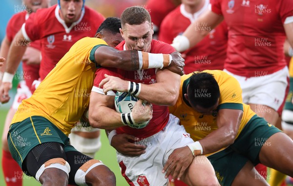 290919 - Australia v Wales - Rugby World Cup - George North of Wales is tackled by Isi Naisarani and Allan Alaalatoa of Australia