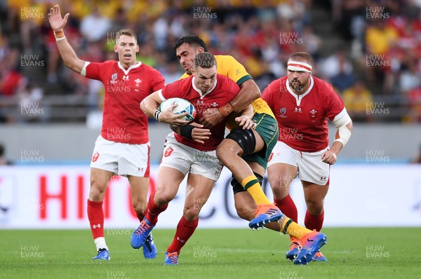 290919 - Australia v Wales - Rugby World Cup - George North of Wales is tackled by Rory Arnold of Australia