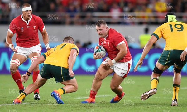 290919 - Australia v Wales - Rugby World Cup - Dillon Lewis of Wales is tackled by James Slipper of Australia