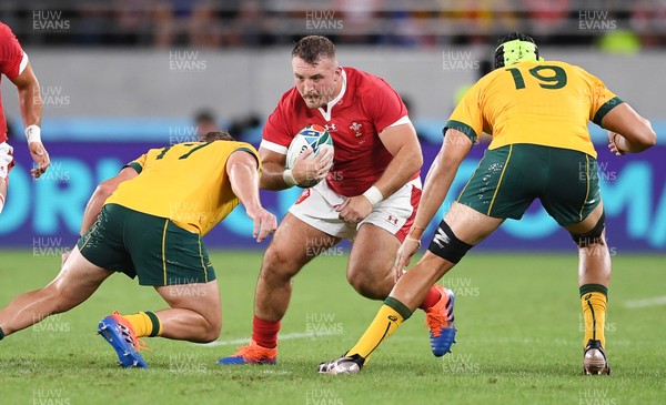 290919 - Australia v Wales - Rugby World Cup - Dillon Lewis of Wales is tackled by James Slipper of Australia