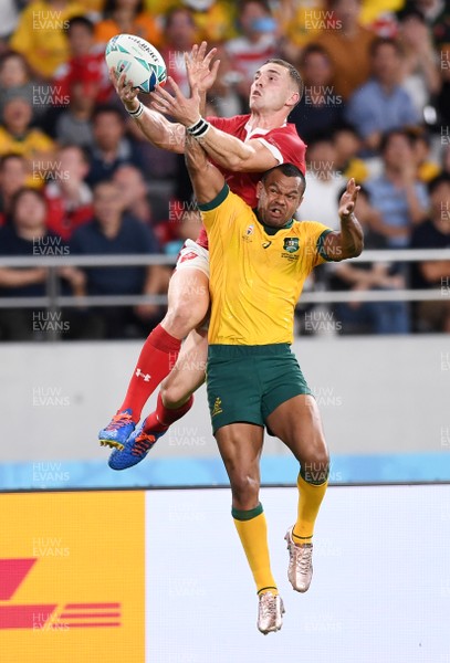 290919 - Australia v Wales - Rugby World Cup - George North of Wales fumbles the ball in the air with Kurtley Beale of Australia